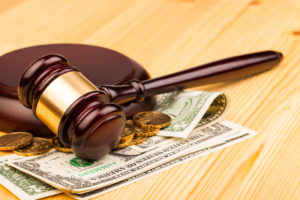 Harrisonburg-Bankruptcy-Lawyer-wooden-gavel-with-money-underneath
