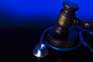 DC Best Lawyers - Wooden law gavel with stethoscope - medical law and justice concept