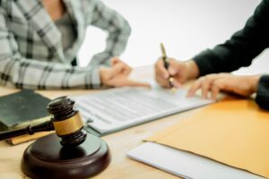 A lawyer explaining to their client if mediation is legally binding in personal injury cases