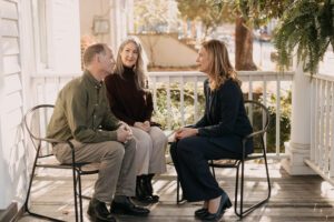 Wrongful death attorney Lauren Byrne meeting with clients