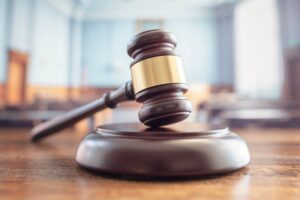 A judge’s gavel on a desk. What percentage of personal injury cases go to trial?